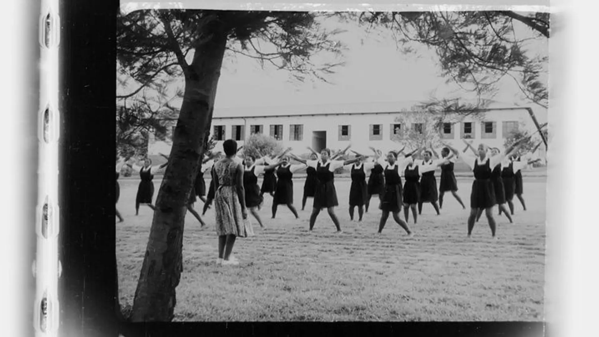 A black and white picture of black learners at school during apartheid