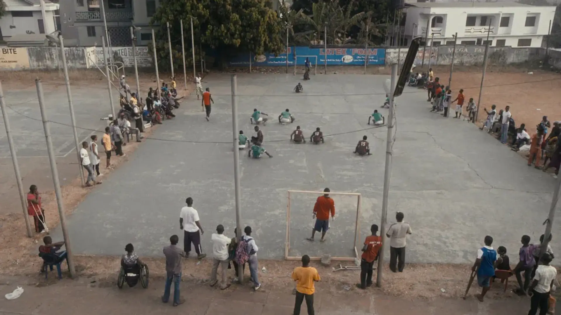 A skate soccer field with spectators watching a game.